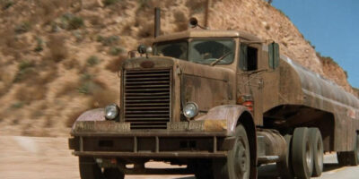The truck - a 1955 Peterbilt 281, dirtied, greasy, and aged - used in the film Duel in 1971. Here is it seen driving on a dusty, desert road. Duel (1971)