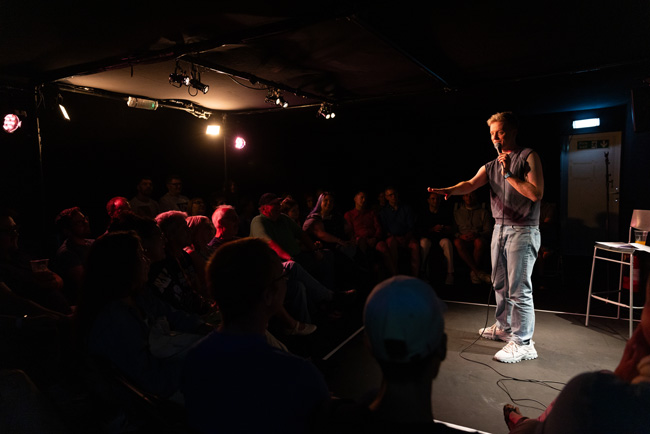 James Barr on stage performing Sorry I Hurt Your Son (Said My Ex to My Mum)