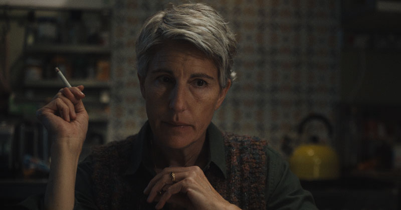 Tamsin Greig - looking concerned and sporting short, greying hair - in the short film, Largo.