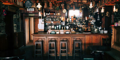 A generic image of an English pub and its main bar.