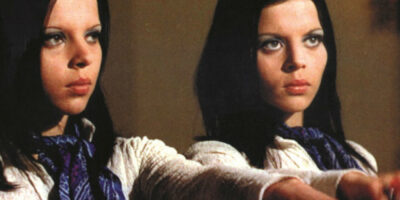 Two young women offer themselves as sacrifices in the film, The Nude Vampire.