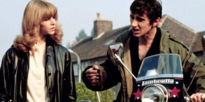 Phil Daniels and Leslie Ash with a motorbike in the film Quadrophenia.