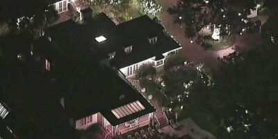 Rob Reiner's home - during the hours of dark - from above after his murder in 2025.
