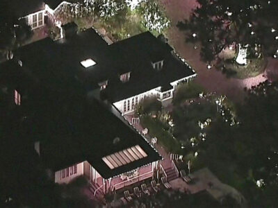 Rob Reiner's home - during the hours of dark - from above after his murder in 2025.