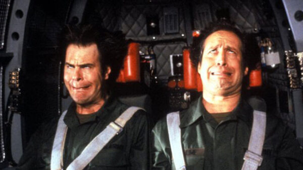 Dan Aykroyd and Chevy Chase experience strong G-forces, causing their faces to contort in an amusing way, in the film Spies Like Us.