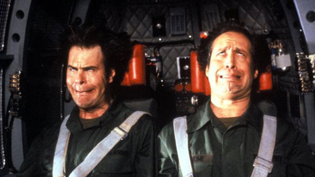 Dan Aykroyd and Chevy Chase experience strong G-forces, causing their faces to contort in an amusing way, in the film Spies Like Us.