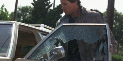 Arnold Schwarzenegger as the Terminator smashes a car window on Sunset Boulevard - it was shot without permits or a stunt double.